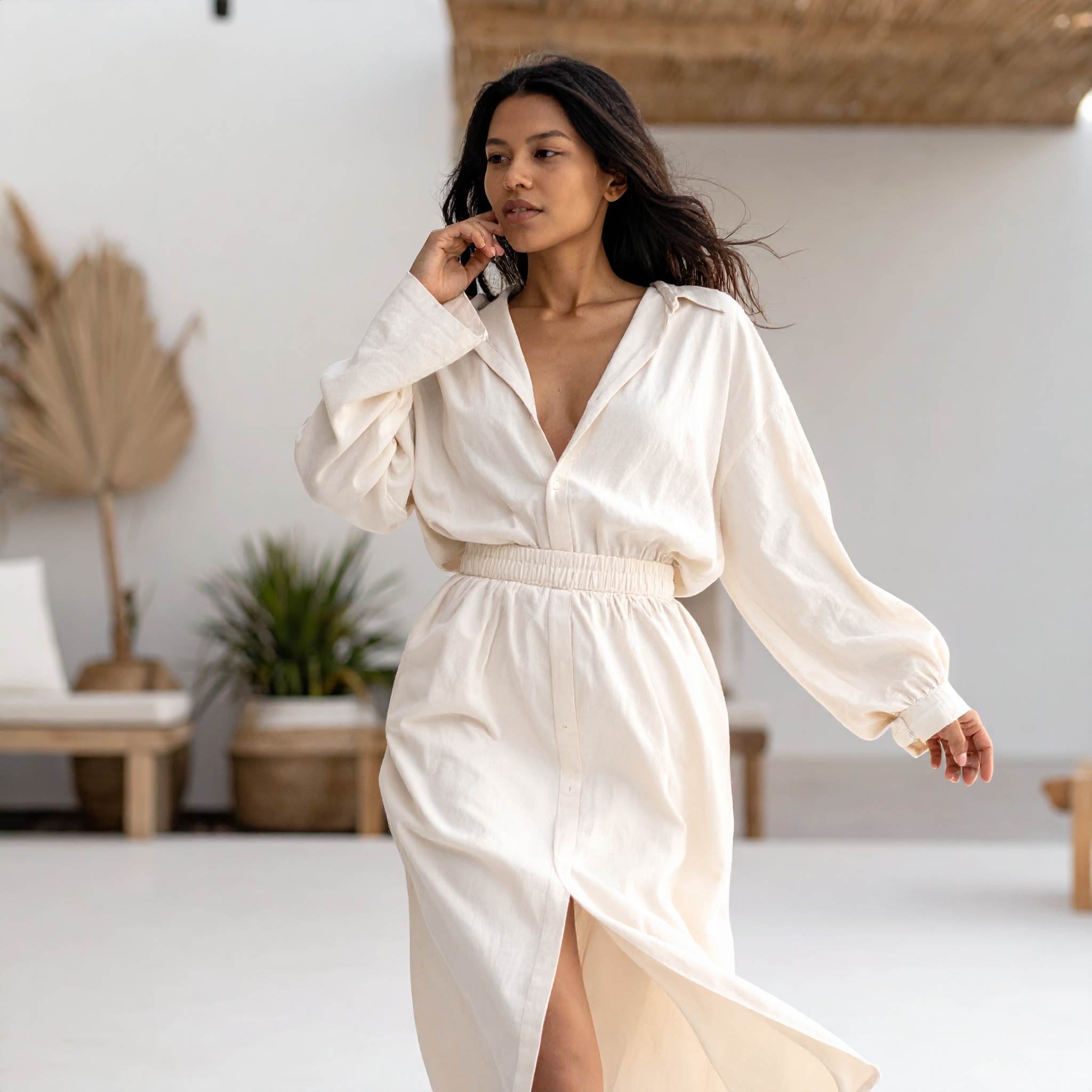 A circle of figures in soft warm light, leaning slightly inward.